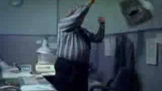 office stress  throwing computer(a guy gets pissed off at work so he throws his computer over the wall, then jams a guys tie in the paper shredder., 2008-07-16T03:20:16.000Z)