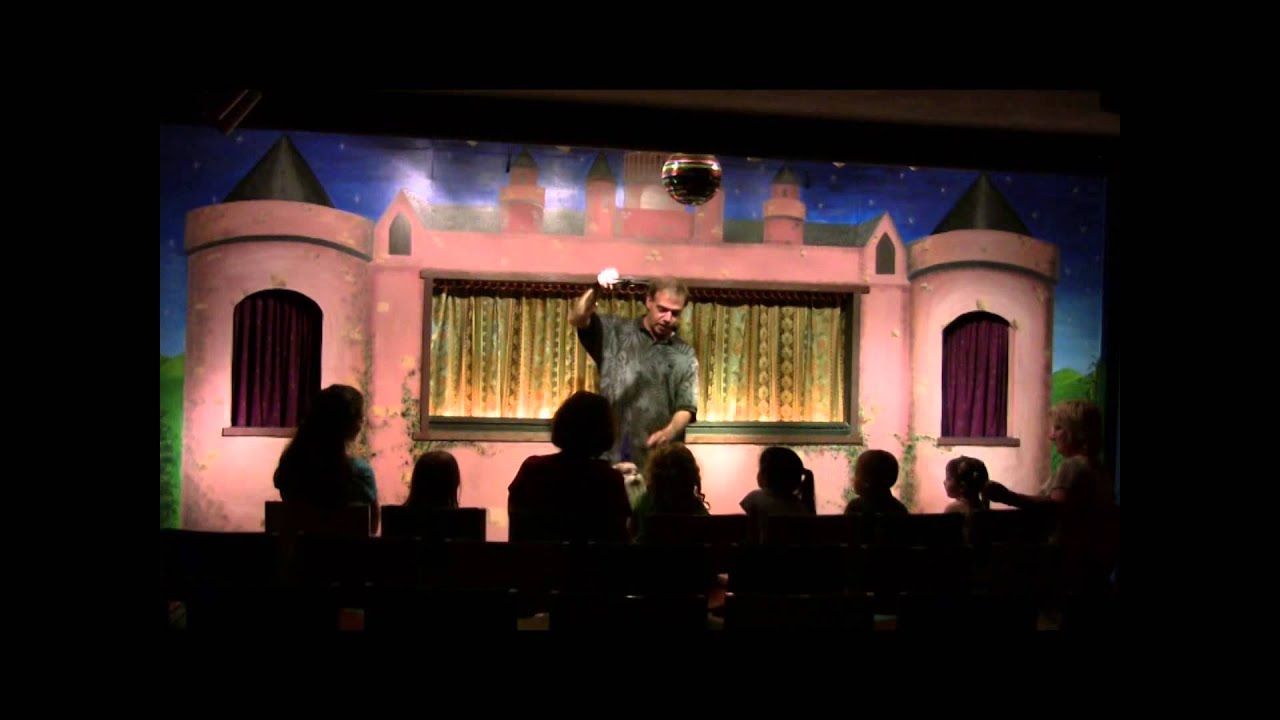 Paul L'Ecuyer demonstrating puppets at the Drawbridge Theater