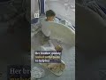 Big brother removes blanket caught on baby sister’s head #shorts