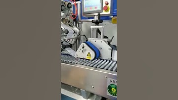 Labeling machine for plastic tubes