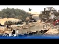 IDF tanks and bulldozers enter Gaza Strip eliminating Hamas terrorists en route