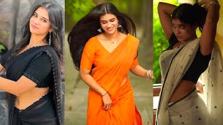 Madhu Stunning Posing with White Chiffon Saree and Transparent Black Saree With Round Neck Blouse screenshot 5