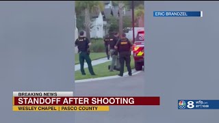 Pasco County Sheriff's Office: A man is barricaded in a Wesley Chapel home after he shot a woman