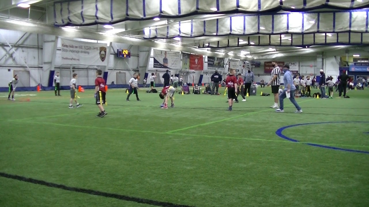 26 Silky Hogan-Ravens rusher Cara darts in to take Cardinal QB's flag  before he gets too far.