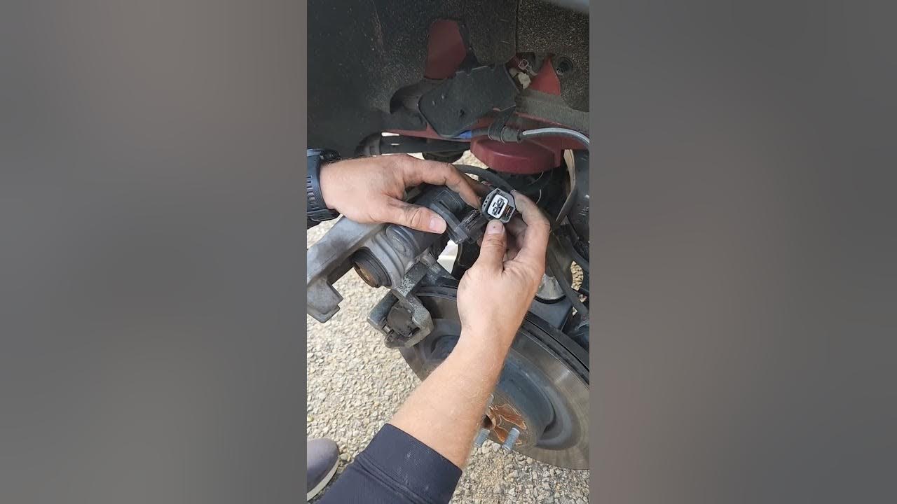 2022 Nissan Pathfinder rear brake pad replacement retracting electric