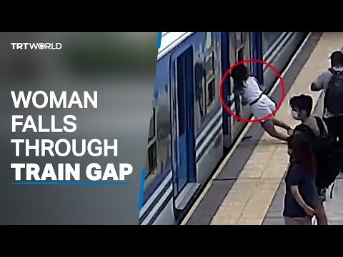 Woman falls through gap of moving train in Argentina