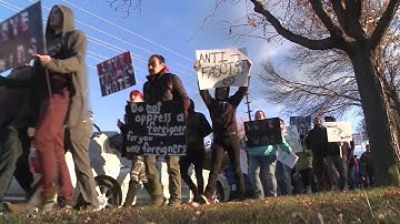 Neighborhood protests Nazi flag