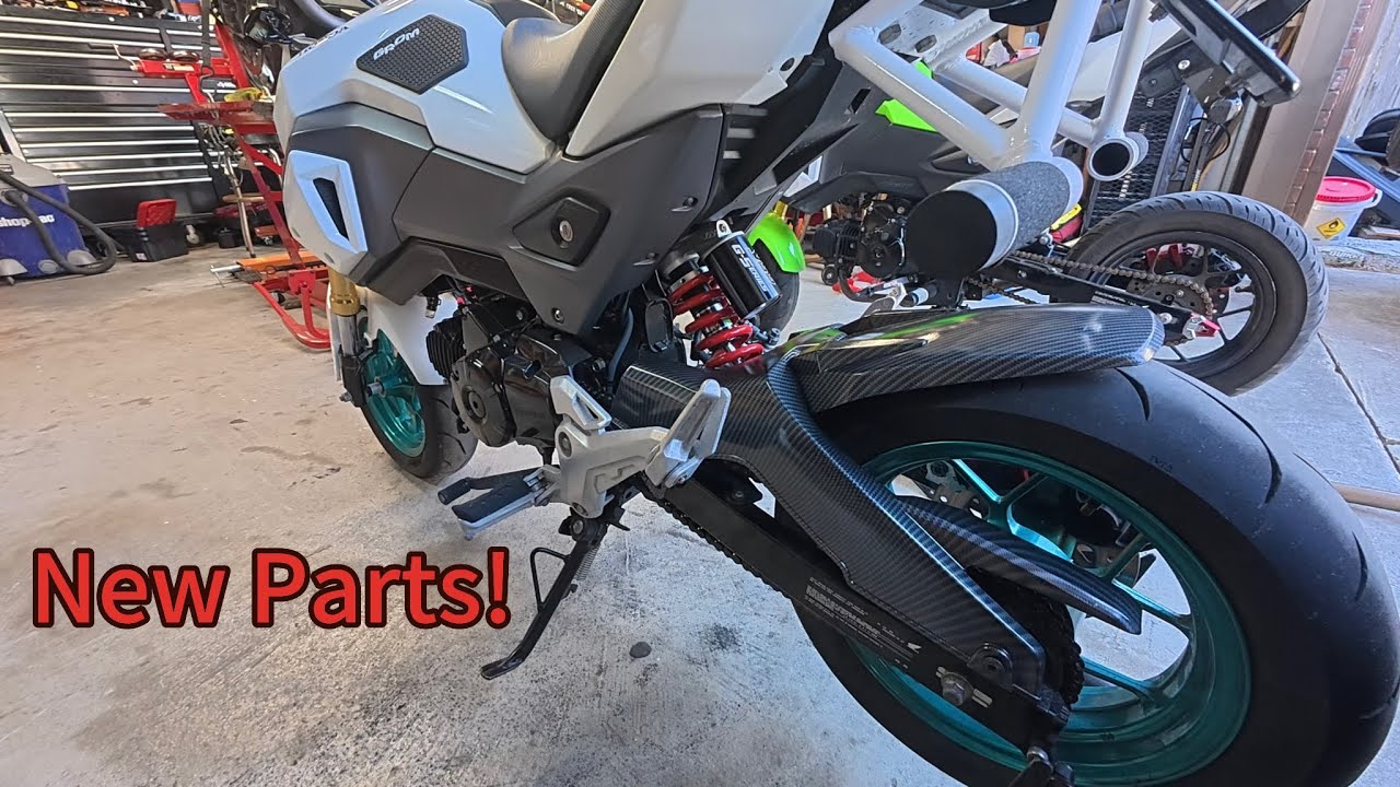 Installing  parts on the Grom and inspecting the damage to the new project bike