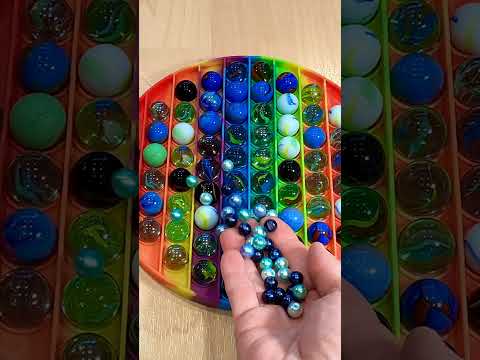 Marbles Filling Every Single Bump in Pop It Toy vs. Pearl Like Beads