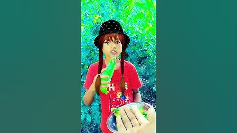 Survival Skills: SIMPLE but USEFUL The girl is wearing a black hat and eating a raw banana #survival
