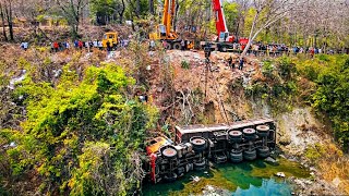 Shocking Accident! Massive Cargo Truck Flips and Plunges into Deep River Canyon!