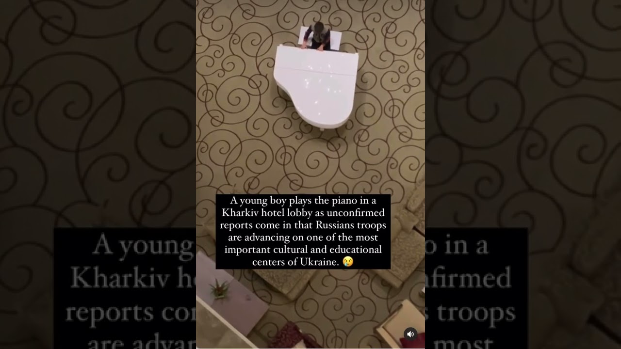 Young boy plays piano while hotel is under attack in ukraine