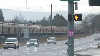 EB UP with Canptex and led by Canadian Pacific & KCP painted Units; Portland, Oregon 