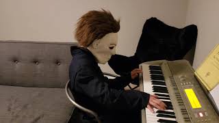 Michael Myers playing the Halloween theme