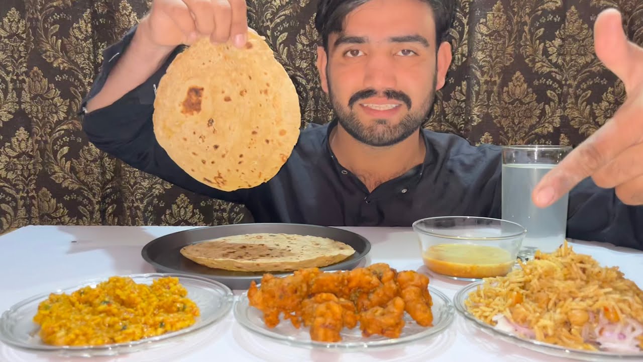 Daal roti with biryani and pakory ,chatni