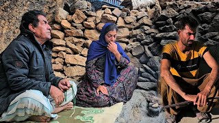 Leila and her mother are baking traditional bread, while her father goes about his daily chores.