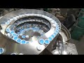 Vibratory Feeder Rebuild for High Rate Cap Machine SATISFYING ROBOT- Feeding Concepts Inc.