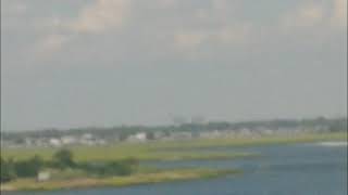 Loop Parkway drawbridge east/southbound in my White Jeep Cherokee.