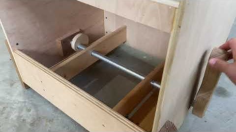 Cam shaft style retractable casters for a table saw or work bench