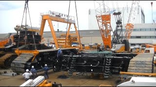 Assemble Giant Crawler Crane. Heavy Equipments In Bridge Construction. Causes of crane accidents