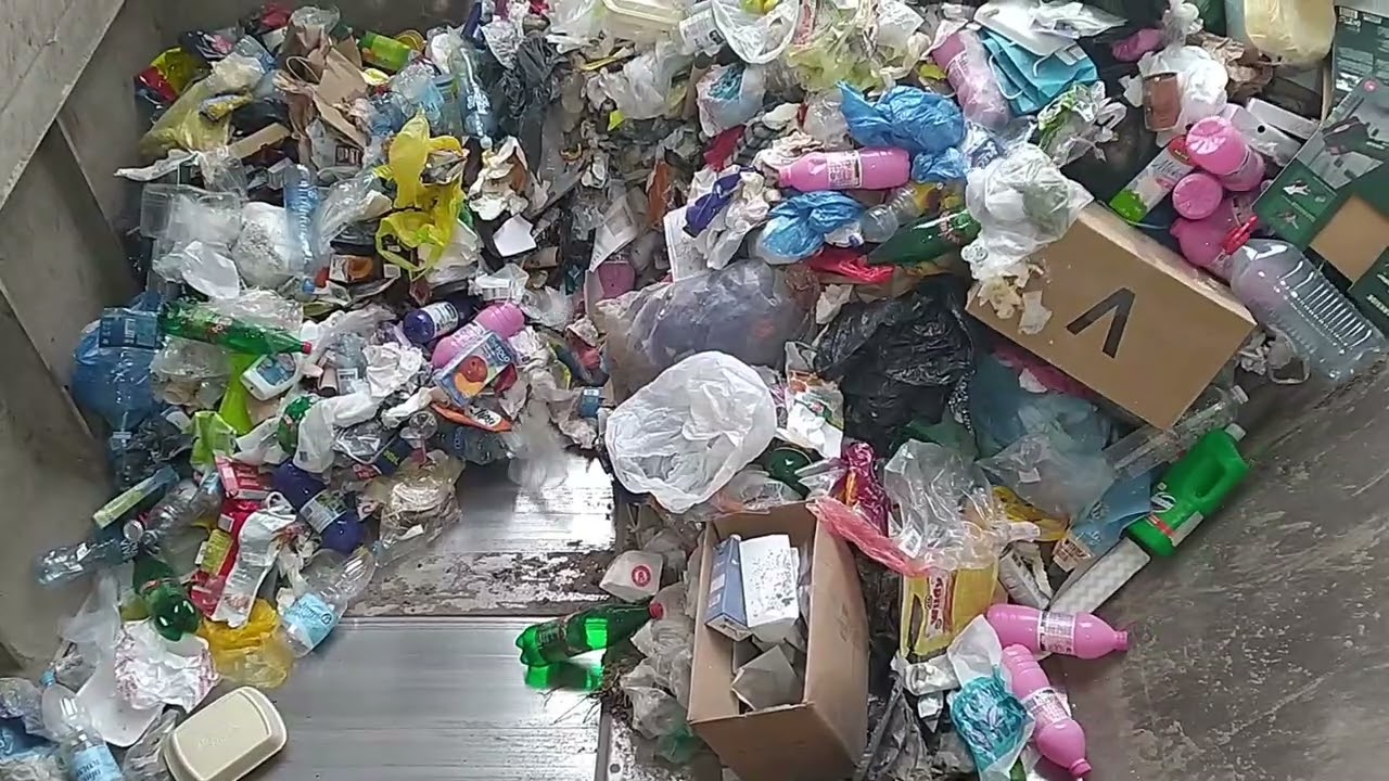 Transfer Station. Mixed Waste Compaction. Original Sound Only.