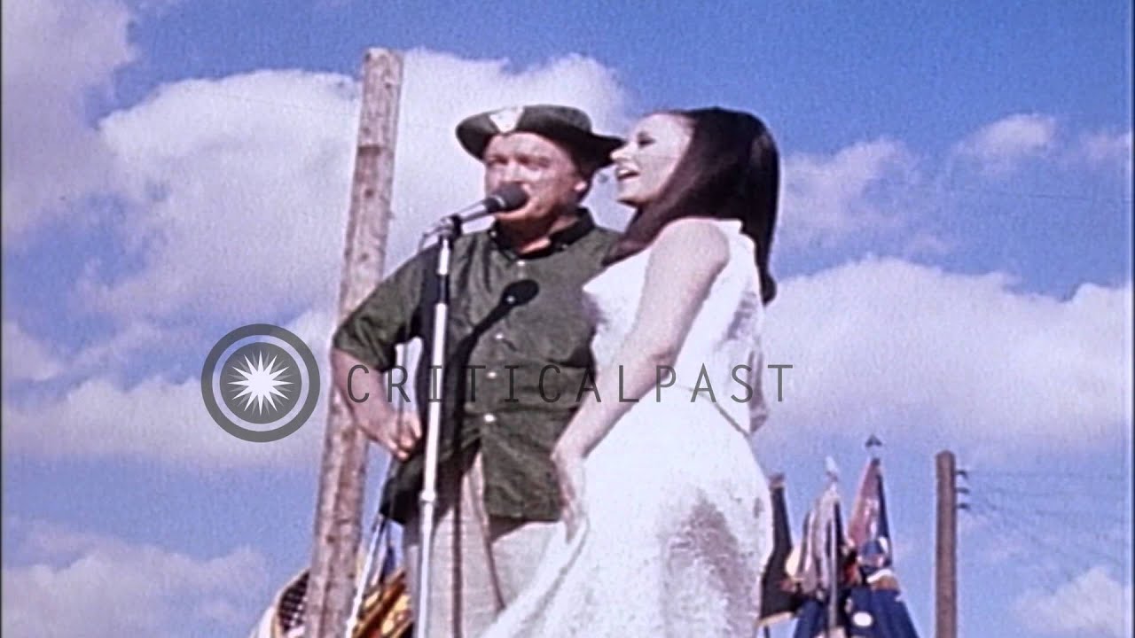 Miss Universe winner Madeleine Hartog Bell and Bob Hope at camp Enari