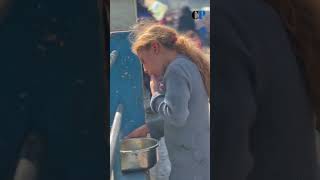 Palestinian Girl Licking The Dish To Fill Her Stomach.