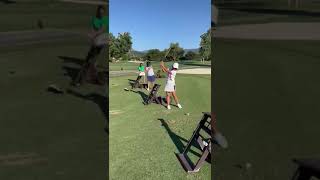 Nim and her friends taking a golf lesson.