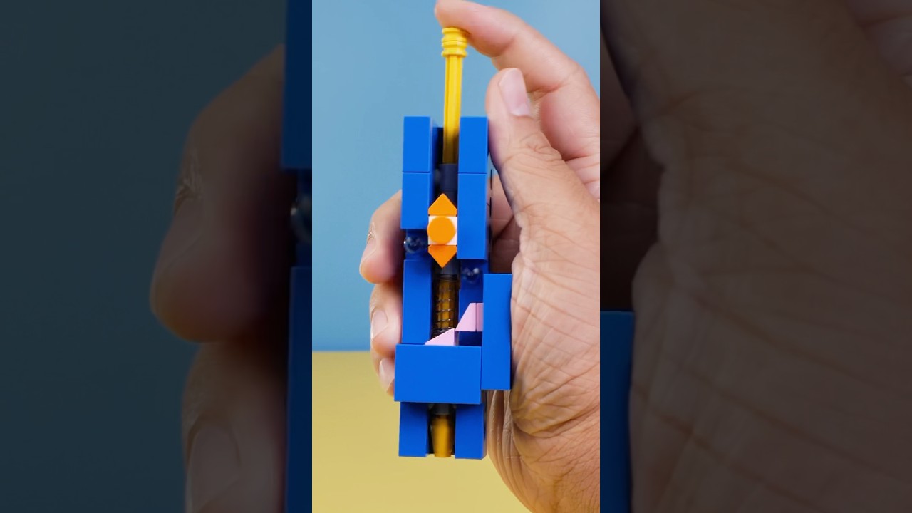 A simple LEGO fidget that explains ballpoint pen mechanism 