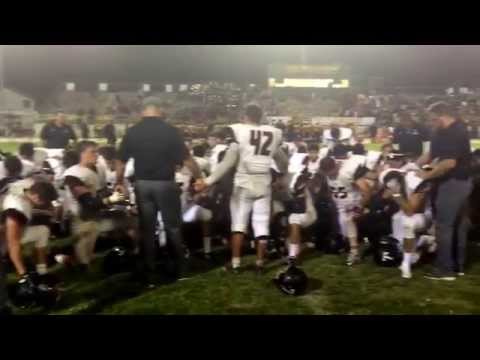 Team prayer. Thank God for the W!