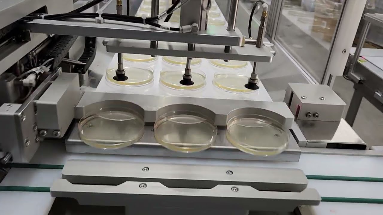 IQ-M2000 Petri Dish Filling Machine filling 90mm mono dishes.