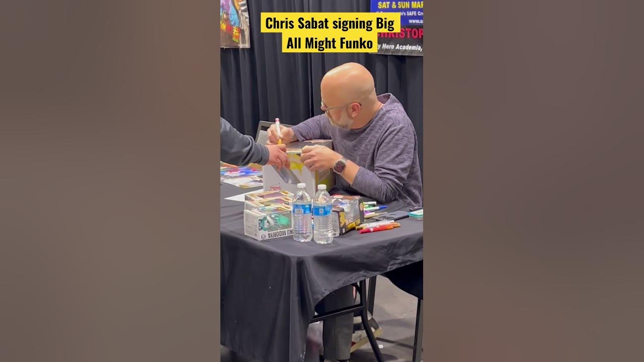 Chris Sabat signing Big All Might Funko shorts