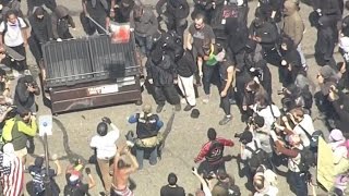 As demonstrators took to the streets demanding president trump's tax
returns on saturday, marchers in berkeley, california, got into a
series of scuffles. po...