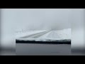 Cloud of snow blankets highway after avalanche