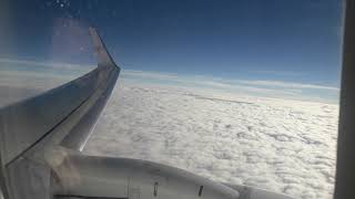 Pemandangan di atas awan di pagi hari, terbang bersama sriwijaya air