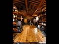 Why did Dick Proenneke use a gravel floor instead of a wooden one?