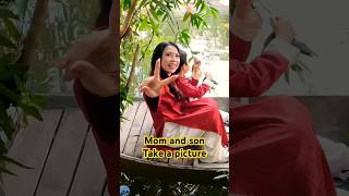 Mom And Son Take A Picture