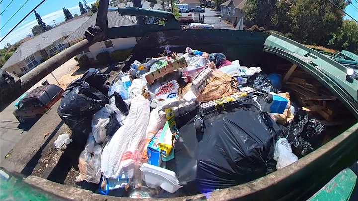 Waste Management front load commercial garbage truck 