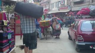 Carrying duffle bag through Kathmandu