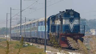 Hardcore Chugging WDP-1 led Moradabad Passenger Beautifully curves
Location: Dasna, Ghaziabad, Uttar Pradesh
18th October 2014, 1020 Hrs
Train: Delhi - Moradabad Daily Passenger
Locomotive: Tughlakabad(TKD) WDP-1#15041
We rarely see these handsome WDP-1s nowadays, they were very frequent with passengers back then. Seen here is hardcore chugging TKD WDP-1 trying to attain MPS after departing from Adhyatmik Nagar.
Few Railfans were on board this train to reach somewhere down the line to capture Lucknow Double Decker Trial.
Railfan Dennis Jacob can be seen at 00:19 waving and shouting my Name. Hardcore Chugging WDP-1 led Moradabad Passenger Beautifully curves