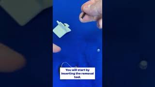 How do I change the wax filter on my GN ReSound RIC (receiver-in-the-canal) hearing aid?