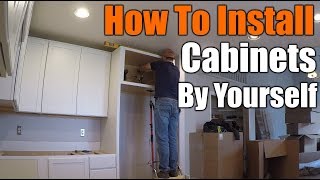 How To Install Upper Kitchen Cabinets By Yourself | THE HANDYMAN  |