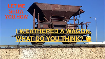 Verwering van een metalen modelspoorwagen