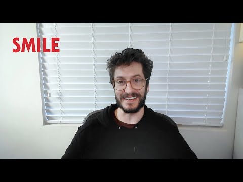 Smile Interview: Director Parker Finn on Bleak Endings & Sequel Potential