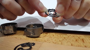 Adjusting the backlash spring on size M bobbin case
