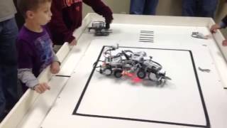 Robot Sumo Rumble between Robot J, Drill Sgt, Thor and Robot X.