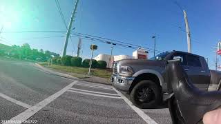 Dodge RAM vs pedestrian walking with bicycle