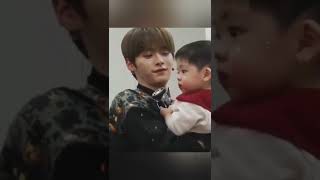 Straykids Lee Know carrying cat as baby