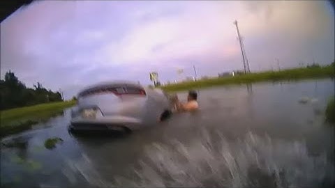 Texas officer honored for saving woman who drove into a lake after having a seizure