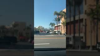 Slow Motion Of San Bernardino Sherrifs Driving By In Downtown San Bernardino